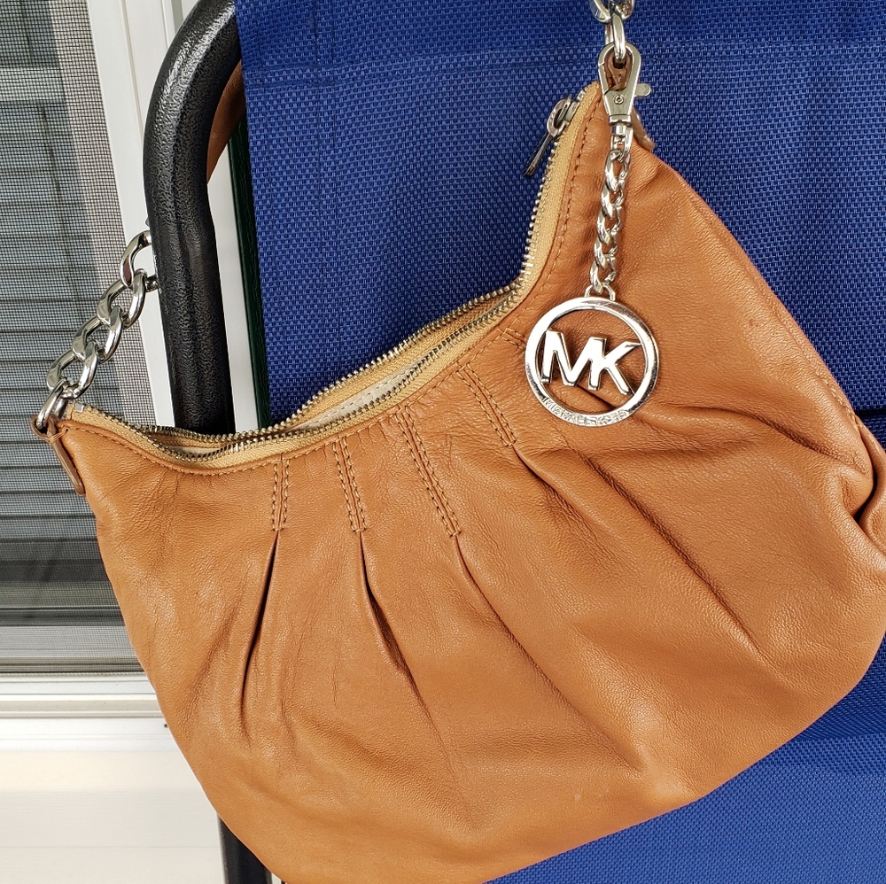 Michael Kors small leather conac colored handbag